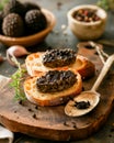 Black winter truffles and truffle cross section. The most famous of the truffles Royalty Free Stock Photo