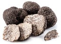 Black winter truffles and truffle slices on white background. The most famous of the trufflez Royalty Free Stock Photo