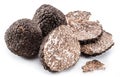 Black winter truffles and truffle slices on white background. The most famous of the trufflez Royalty Free Stock Photo
