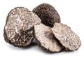 Black winter truffles and truffle slices on white background. The most famous of the trufflez Royalty Free Stock Photo