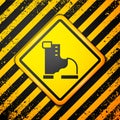 Black Winter warm boot icon isolated on yellow background. Waterproof rubber boot. Warning sign. Vector