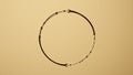 Black wire circle on a beige background Royalty Free Stock Photo