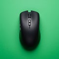 Black wireless computer mouse with a sleek, ergonomic design. Centralized scroll wh Royalty Free Stock Photo