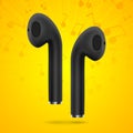 Black wireless earphones on orange background