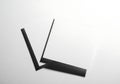 Black wireless network adapter with antenna on a white background Royalty Free Stock Photo