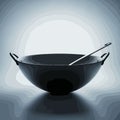Black Wok with Ladle on a Gradient Background Royalty Free Stock Photo