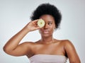 Black woman, apple and afro for diet, natural nutrition or health against a white studio background. Face of African