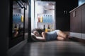 Black Woman Awake For Heat Wave Sleeping in Fridge Royalty Free Stock Photo