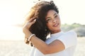 Black woman, beauty and portrait at beach for vacation, freedom and face with natural hair and smile. Happy young female Royalty Free Stock Photo