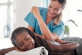 Black woman, bed and smile for spa back massage, treatment or relaxation in stress relief at resort. Happy African Royalty Free Stock Photo