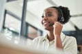 Black woman, call center and phone consultation with a smile in a office with contact us work. Telemarketing, consulting Royalty Free Stock Photo