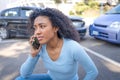 Black woman calling insurance support after car crash Royalty Free Stock Photo