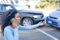 Black woman calling insurance support after car crash Royalty Free Stock Photo
