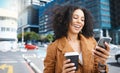 Black woman, city and laughing with phone, coffee and social network with smile. Happy female walking in urban street