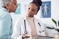 Black woman, doctor and elderly patient for consultation, advice and report with results for health. Healthcare, senior Royalty Free Stock Photo