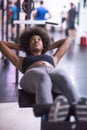 Black woman doing sit ups at the gym Royalty Free Stock Photo