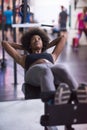 Black woman doing sit ups at the gym Royalty Free Stock Photo