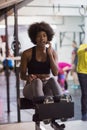 Black woman doing sit ups at the gym Royalty Free Stock Photo