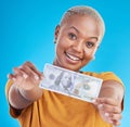 Black woman, dollar and finance, portrait and happy with prize, loan and cash on blue background. Money, cashback and