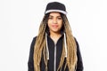 Black woman with dreadlocks in a blank baseball cap and hoodie is on a white background