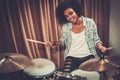 Black woman drummer in a studio Royalty Free Stock Photo