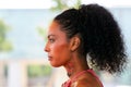 Black woman with earrings. Afro hairstyle Royalty Free Stock Photo