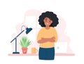 Black woman entrepreneur standing in front of desk with crossed arms. Successful business woman smiling. Cute concept