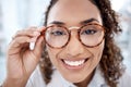 Black woman, face closeup and glasses for eye care, vision and designer frame, prescription lens and optometry. Portrait Royalty Free Stock Photo