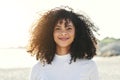 Black woman, face and portrait at beach for vacation, freedom and smile with natural hair and beauty. Happy young model Royalty Free Stock Photo