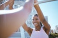 Black woman, fitness sports and high five in urban city for running success, athlete team support or marathon winner Royalty Free Stock Photo