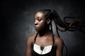 Black woman with the flying long braids Royalty Free Stock Photo