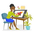 A black woman graphic designer works at the office desk. Royalty Free Stock Photo