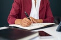 Black woman hands writing on agenda while working Royalty Free Stock Photo