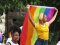 Black Woman Holding Gay Pride Flag