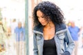 Black woman looking at the shop window Royalty Free Stock Photo