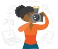 Black woman making a photo with modern camera