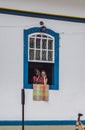 Black woman mannequin and tourist in Ouro Preto, Minas Grais, Brazil