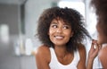 Black woman, mirror and hair with beauty and texture, curly hairstyle or frizz with morning routine in bathroom. Natural Royalty Free Stock Photo