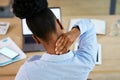 Black woman, neck pain and fatigue at office desk stretching or massage while tired or burnout. Anatomy or health Royalty Free Stock Photo