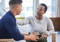 Black woman, office and console man in stress, panic or talking with mental health support in workplace. Professional Royalty Free Stock Photo