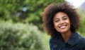 Black woman outdoor in portrait, smile in nature with positive mindset with mockup space. Headshot of happy female
