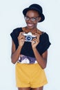 Black woman, photographer and positive in studio with camera, creativity and media for artist with creative talent