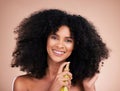Black woman, portrait or afro hair product on isolated studio background in frizz control, curly management or oil