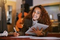 Black woman, portrait smile and tablet writing music in studio for audio track, content creation or development. Happy Royalty Free Stock Photo