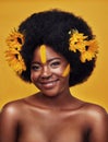 Black woman, portrait and sunflower with skincare in studio for natural glow, cosmetics or soft skin. Person, smile and Royalty Free Stock Photo