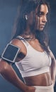 Black woman profile, studio and training with earphones for fitness, phone and music for focus mind. Gen z girl