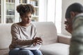 Black woman psychologist give male patient glass of water Royalty Free Stock Photo