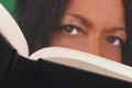 Black woman reading book Royalty Free Stock Photo