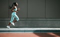 Black woman, run and city sidewalk with training, exercise and fitness on urban road. Street, runner profile and female Royalty Free Stock Photo