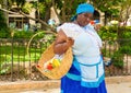 Black woman selling roasted peanuts in Havana Royalty Free Stock Photo